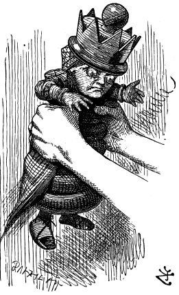 The Red Queen is held up and shaken in Alice’s hands.