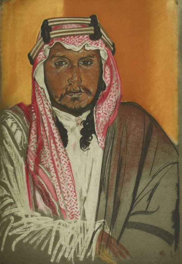 Pastel portrait of an Arab man with long black hair, dark eyes, thin mustache and beard, in a light-coloured robe and patterned red kaffiyeh with a white agal.